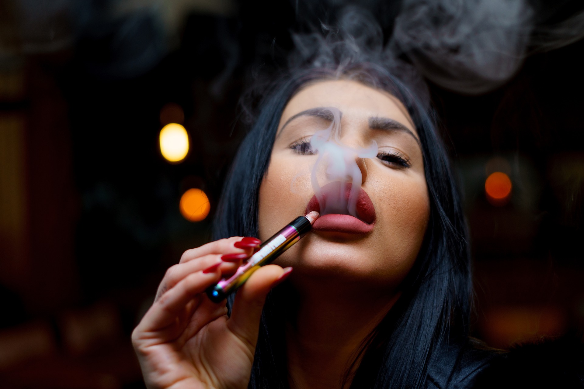 Woman Vaping E-Cigarette